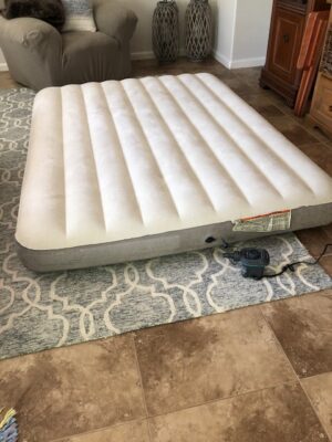 A mattress that is laying on the floor.