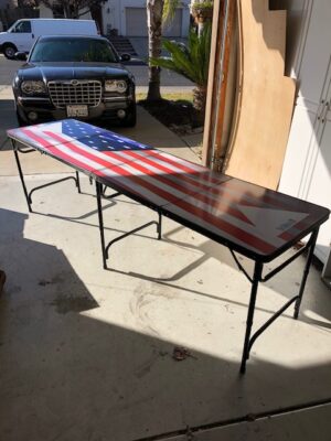 A table with an american flag painted on it.