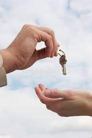 A man and a woman giving each other keys to a house with Add Evening before for 6pm pick up $75.