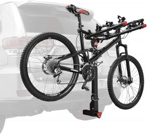 A Allen Sports 4-Bike Hitch Rack attached to the back of a suv.