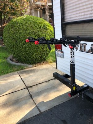 An rv with an Allen Sports 4-Bike Hitch Rack for 2 in. Hitch Deluxe Locking attached to it.