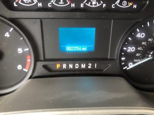 The dashboard of a 2021 Coachmen Freelander 30' Class C has a number of gauges on it.