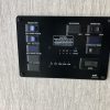 The control panel on the wall of a 2021 Coachmen Freelander 30' Class C.