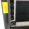 The back of a 2021 Coachmen Freelander 30' Class C with a monitor attached to it.