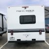 A 2021 Coachmen Freelander 30' Class C parked in a parking lot.
