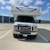 A 2021 Coachmen Freelander 30' Class C parked in a parking lot.