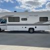 A 2021 Coachmen Freelander 30' Class C parked in a parking lot.