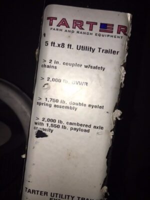 A white trailer with some instructions on it