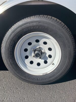 A tire with the center of it on top.