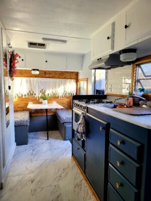 A kitchen with a stove and counter in it