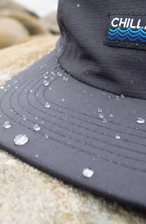 A close up of the water drops on a hat