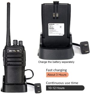 A black walkie talkie is on the charger.