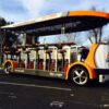 A bus that is parked on the side of the road.