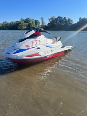 A jet ski is floating on the water.