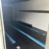 A room with blue lines on the floor