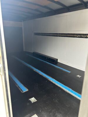 A room with blue lines on the floor